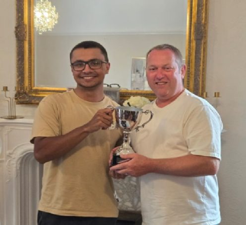 Capt. Mick Accepts Team Trophy