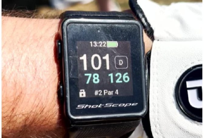 Checking yardage for the approach